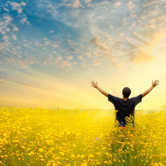 wholeself-blog-images-man-field-arms-up